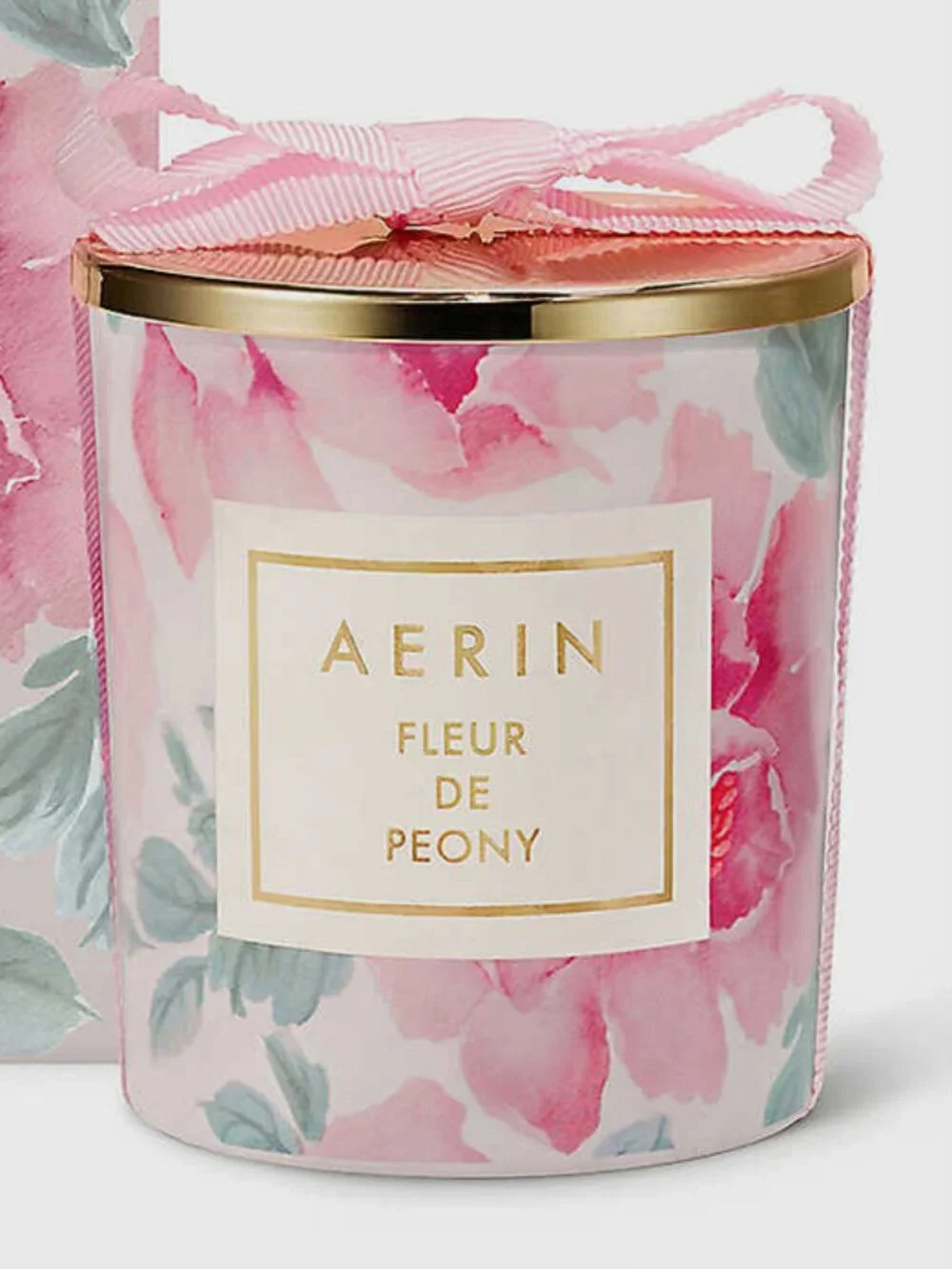 New AERIN candle, Fleur de Peony. 7 ozs. White wax w/ pink floral and gold lid.